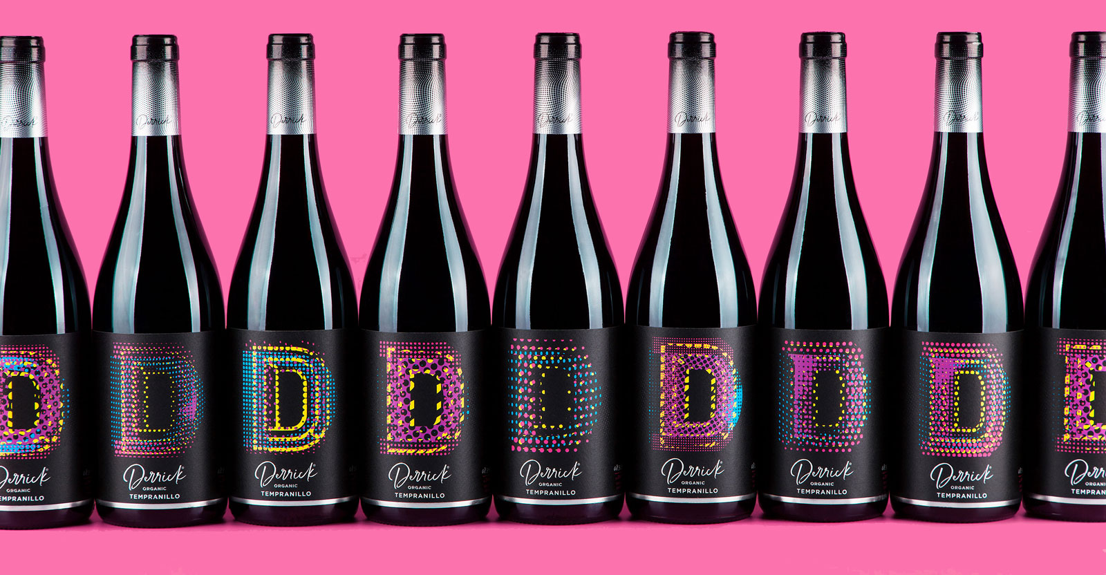A row of Derrick wine bottles with unique labels